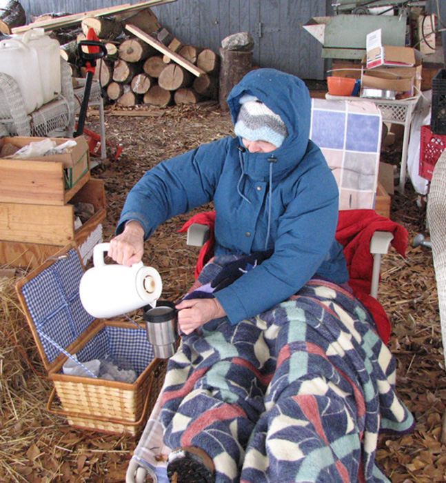 Keeping warm with cocoa and many layers.